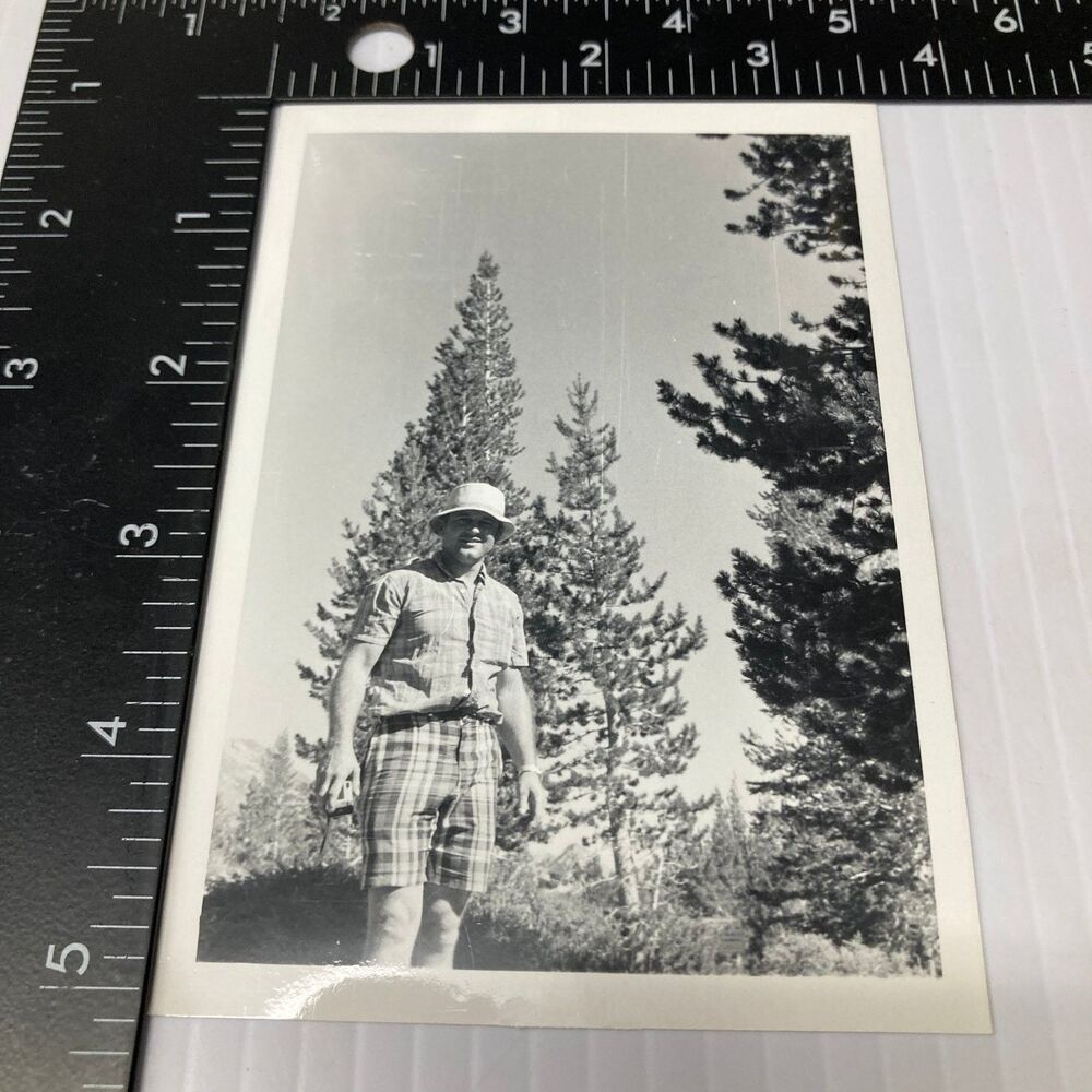 Man Outdoors Mid-Century Snapshot Photograph Pine Trees Plaid Outfit Hat